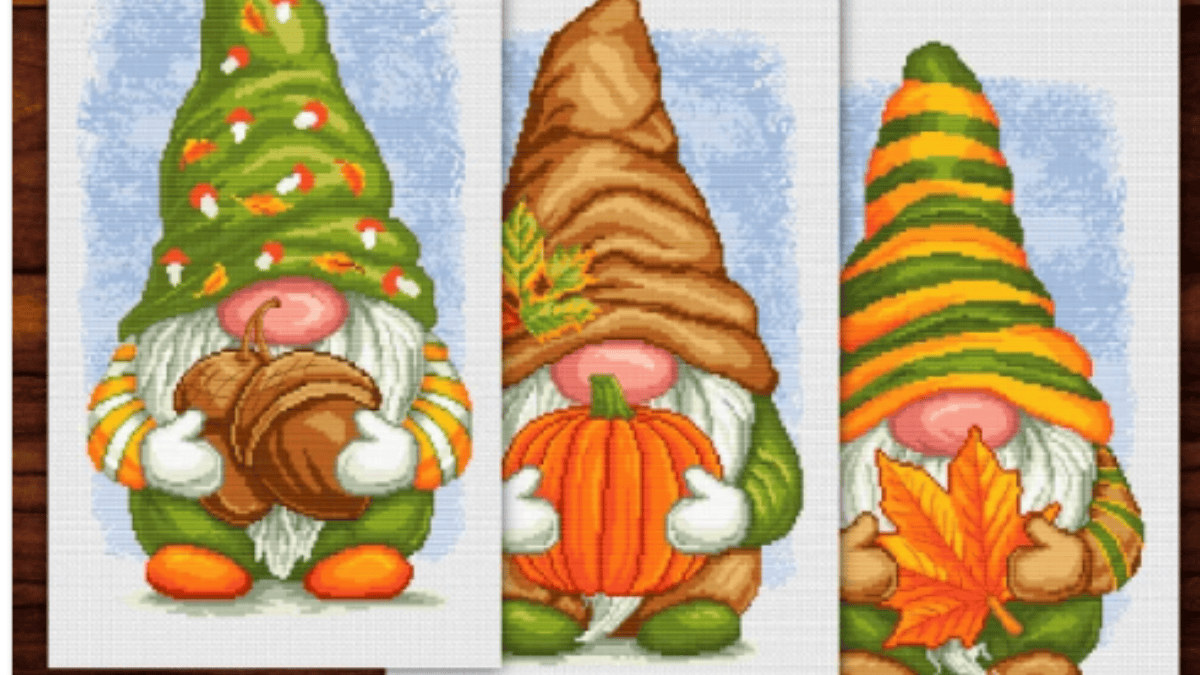 3 fall gnomes holding various fall items