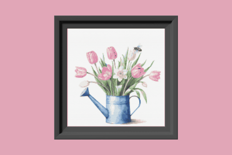 Pink tulips and watering can