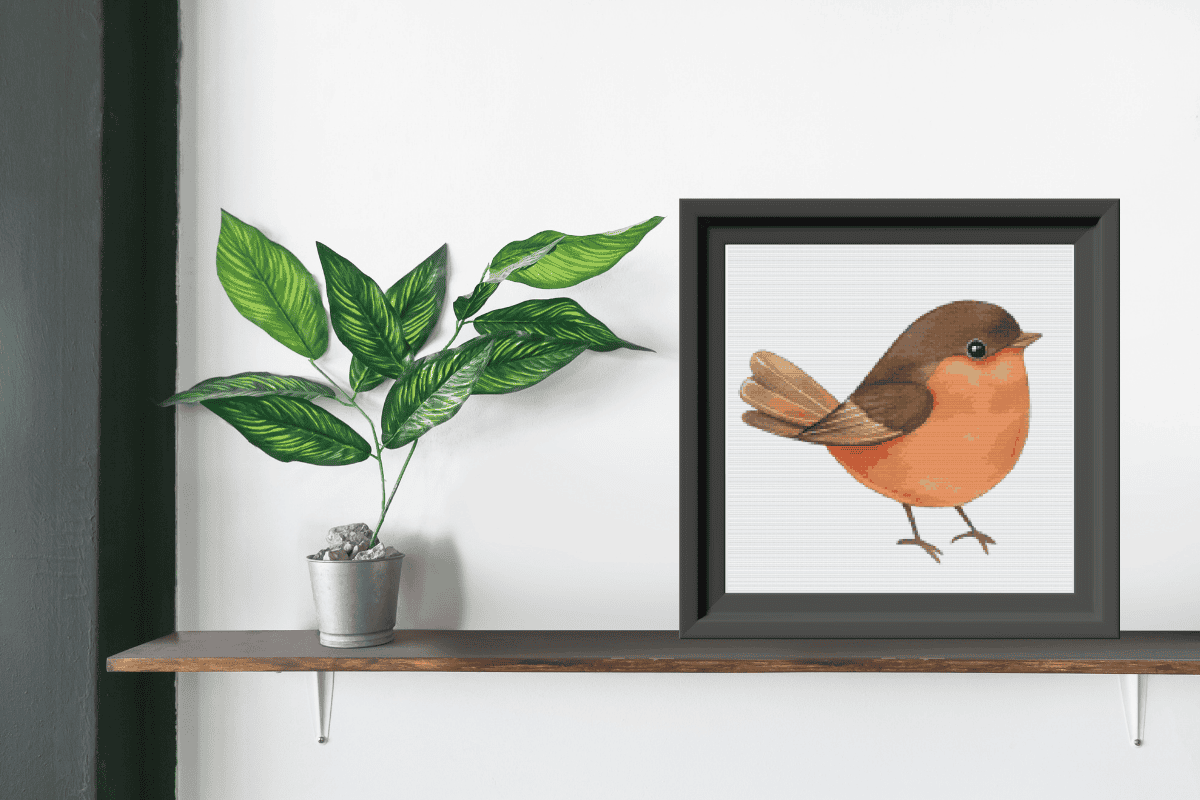 Cross stitch pattern of a little brown bird