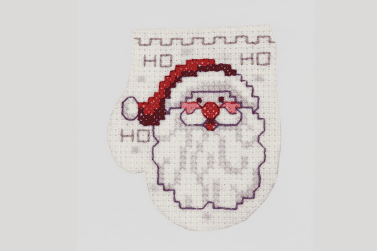 cross stitch santa ornament and word ho ho ho