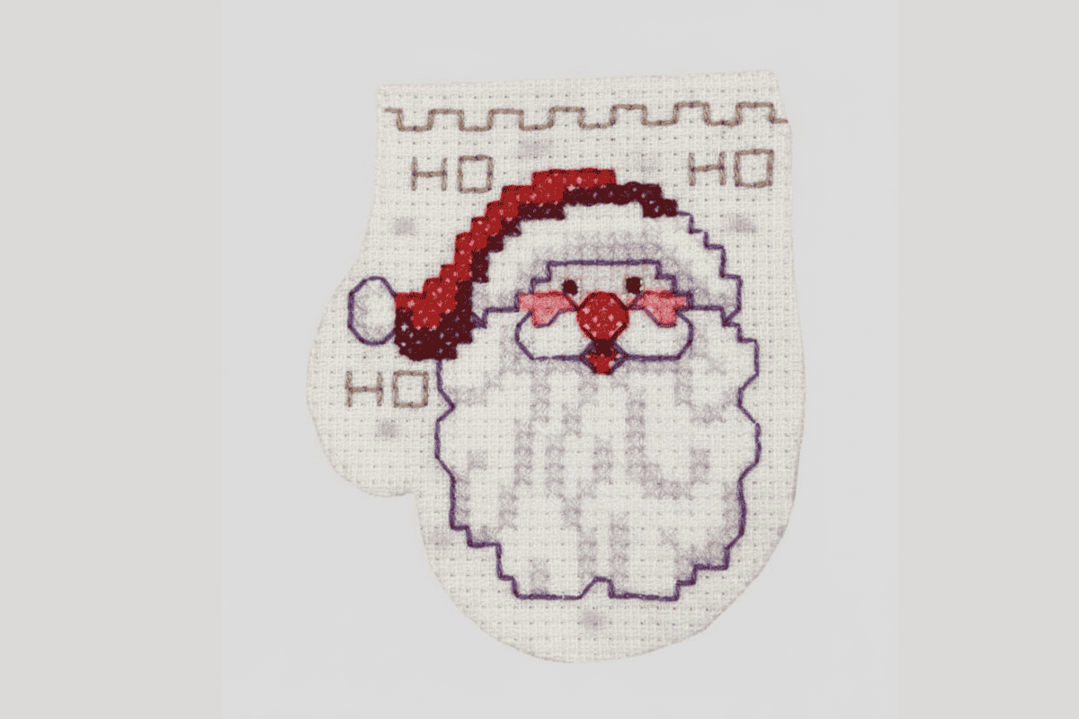 cross stitch santa ornament and word ho ho ho